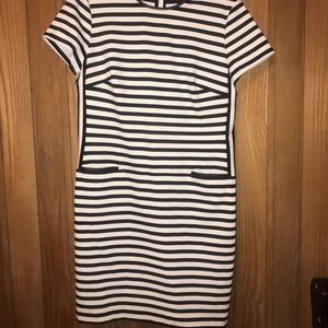 Striped dress with leather accents